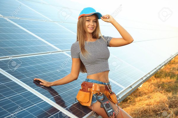 98214653-beautiful-young-engineer-near-solar-panels-outdoors.jpg